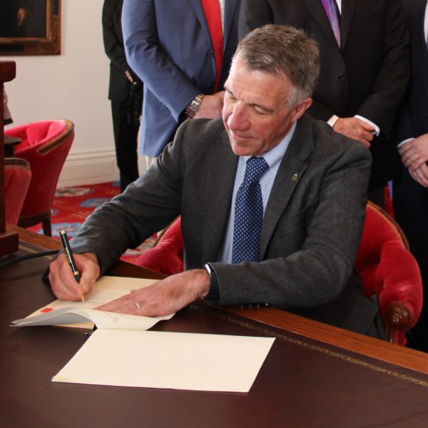 Governor Phil Scott signing captive legislation.