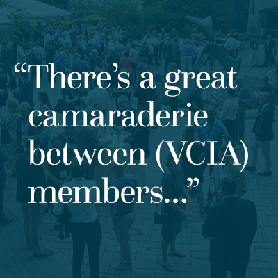 Quote overlaid on a photo of a crowd gathered outdoors: ‘There’s a great camaraderie between (VCIA) members…’